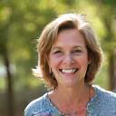 Portrait of Jane Doe, a joyful woman in her late 40s